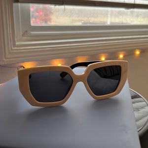 Bold square black and cream sunglasses.